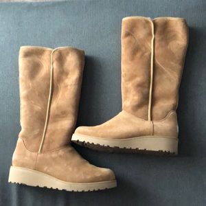 Brand new comfy UGG boots. Nice for winter. Size 8. Brown/light tan.
